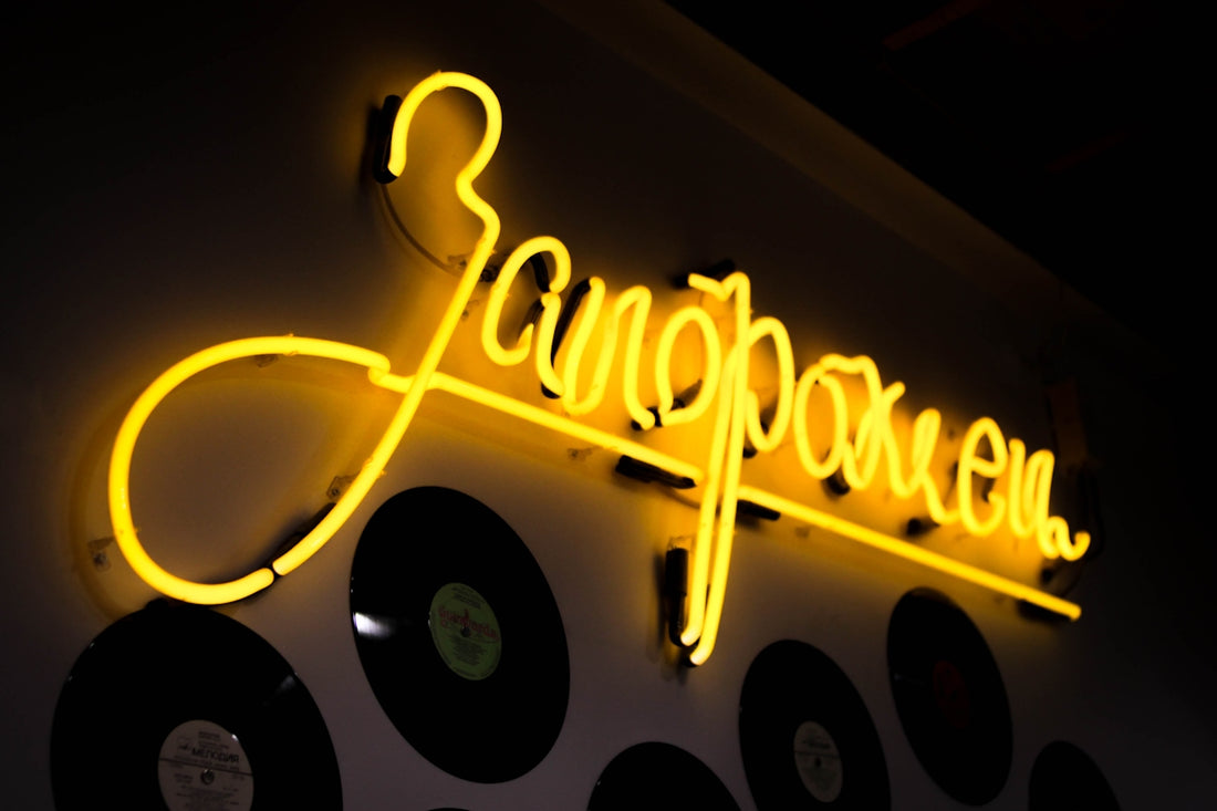 yellow and black love neon light signage
