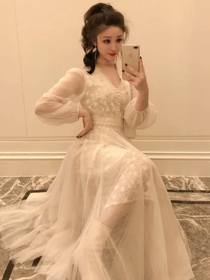Autumn New Korean Edition Fairy Style Dress Women's Solid V-neck Button Gauze Lace Long Sleeves Wrap Waist Slim A-line Dresses