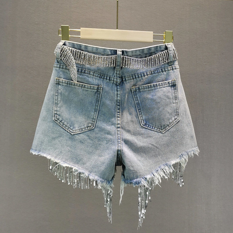 Short en jean à pampilles et perles